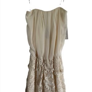 Romper in creme color strapless crochet short bottom size medium